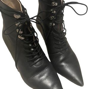 Diesel lace up gothic pointed toe boot heel.